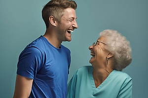 Pfleger und Patientin lachen